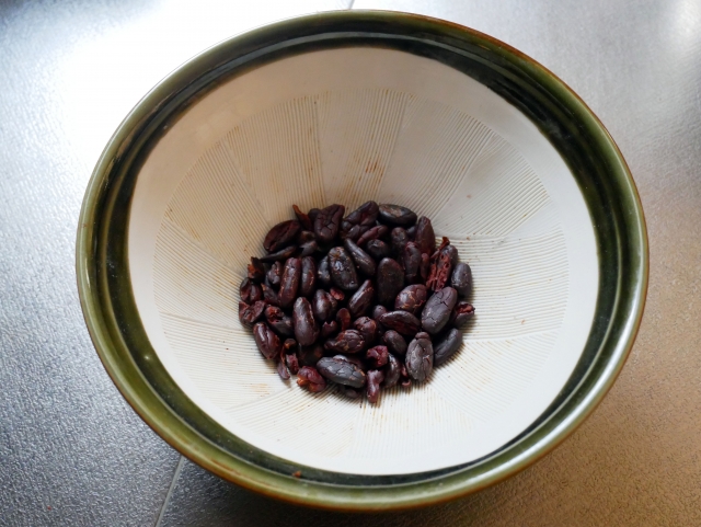 Crush the cocoa beans into small pieces